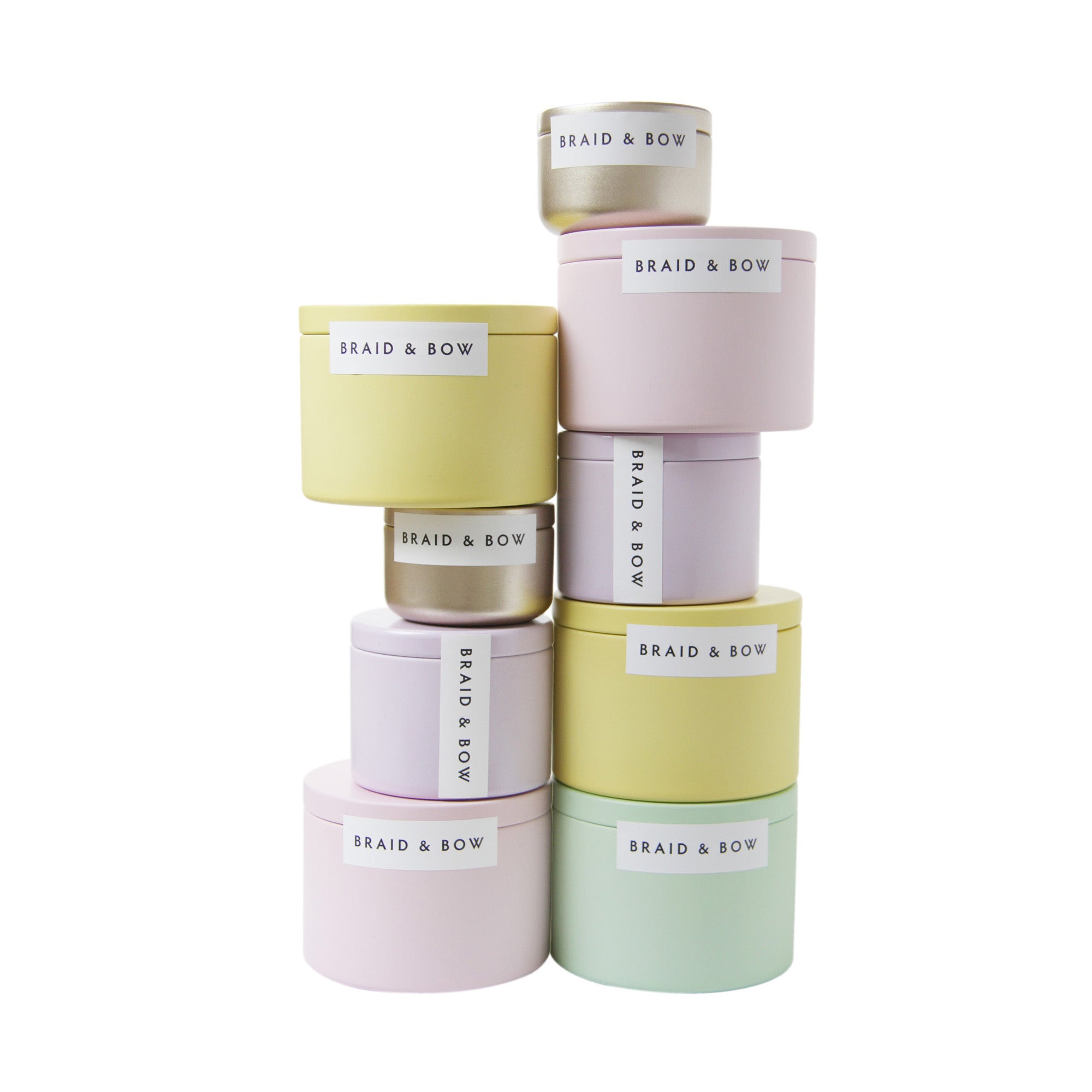 Stack of pastel-colored Braid & Bow tings on a white background