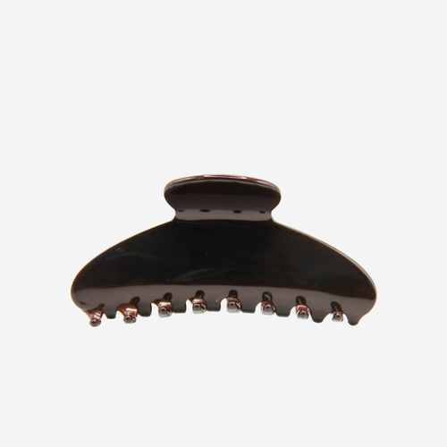 Chocolate Brown oval hair claw on an off white background