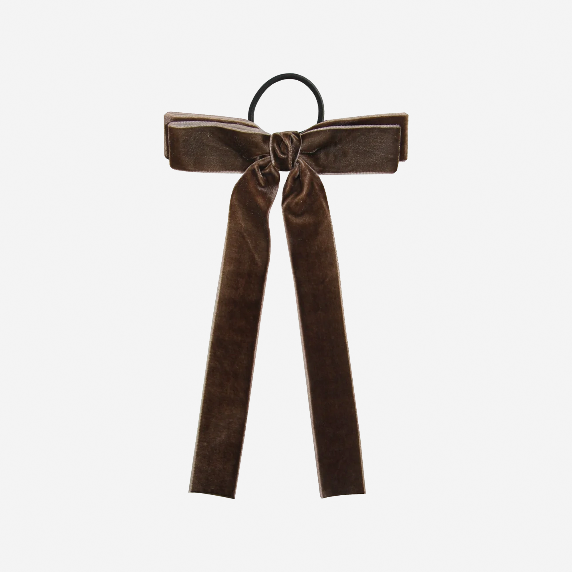 Brown velvet ribbon hair tie on an off white background