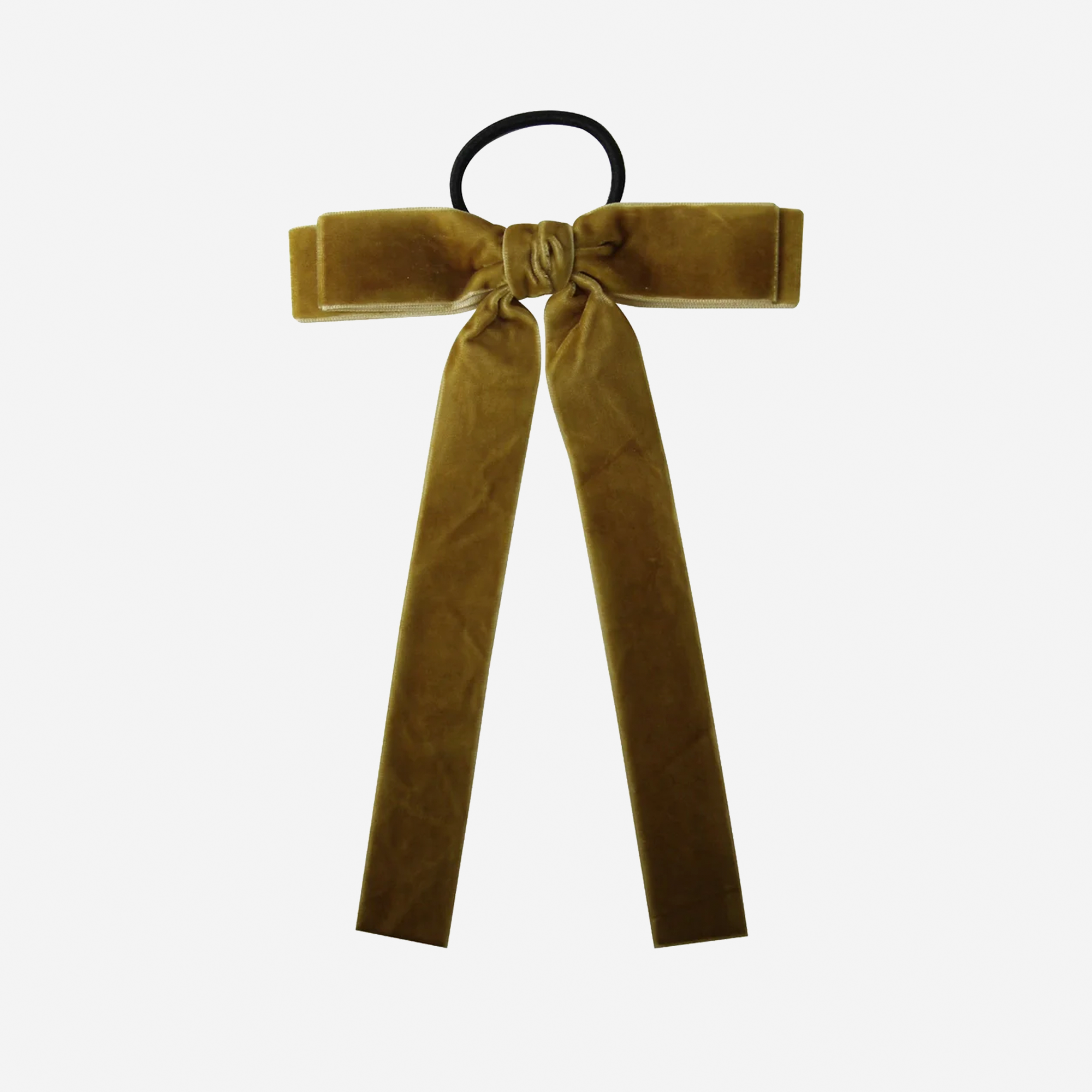 Mustard velvet bow hair tie on an off white background