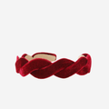 Red berry velvet wave headband on an off white background