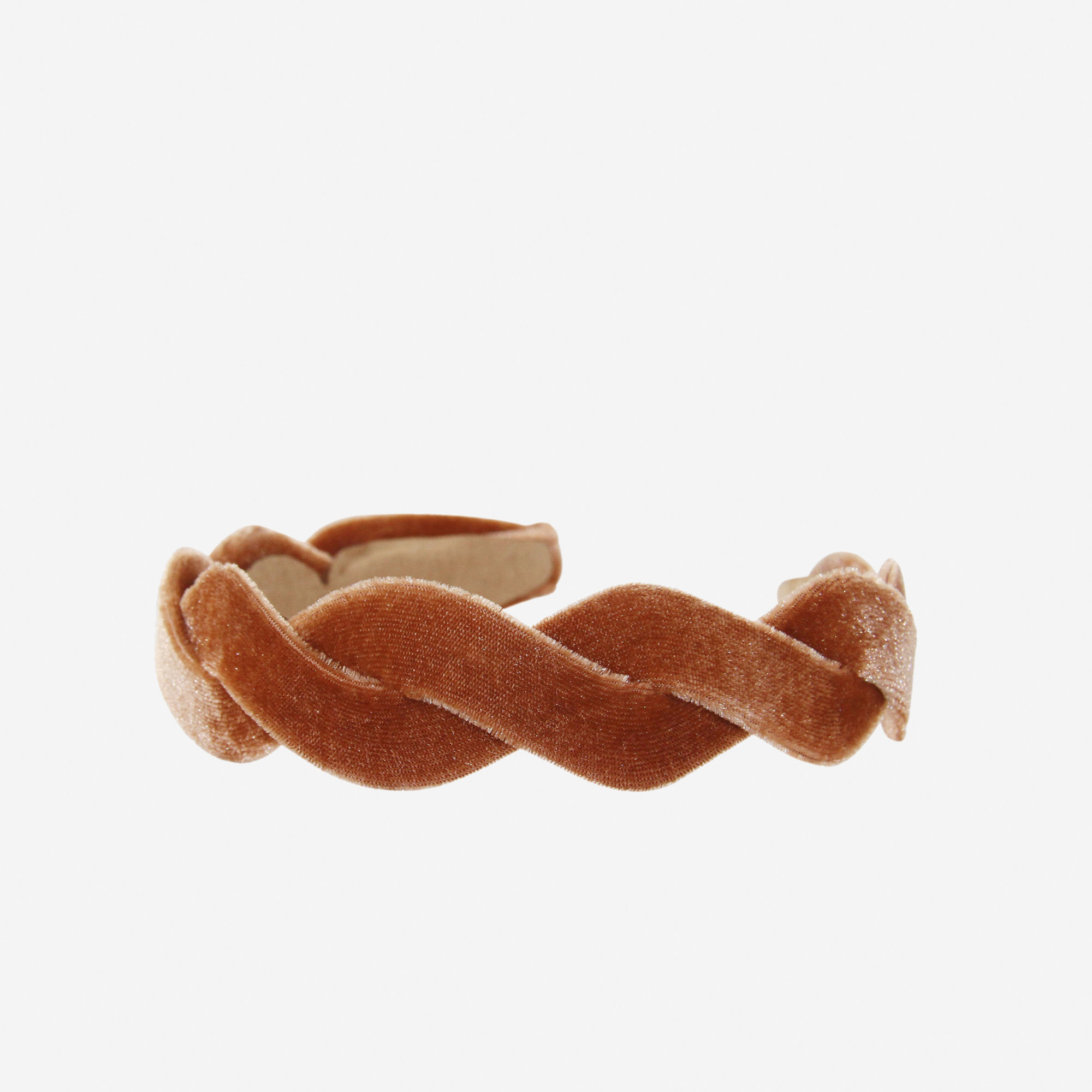 Caramel velvet wave headband on an off white background