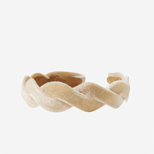 Champagne velvet wave headband on an off white background
