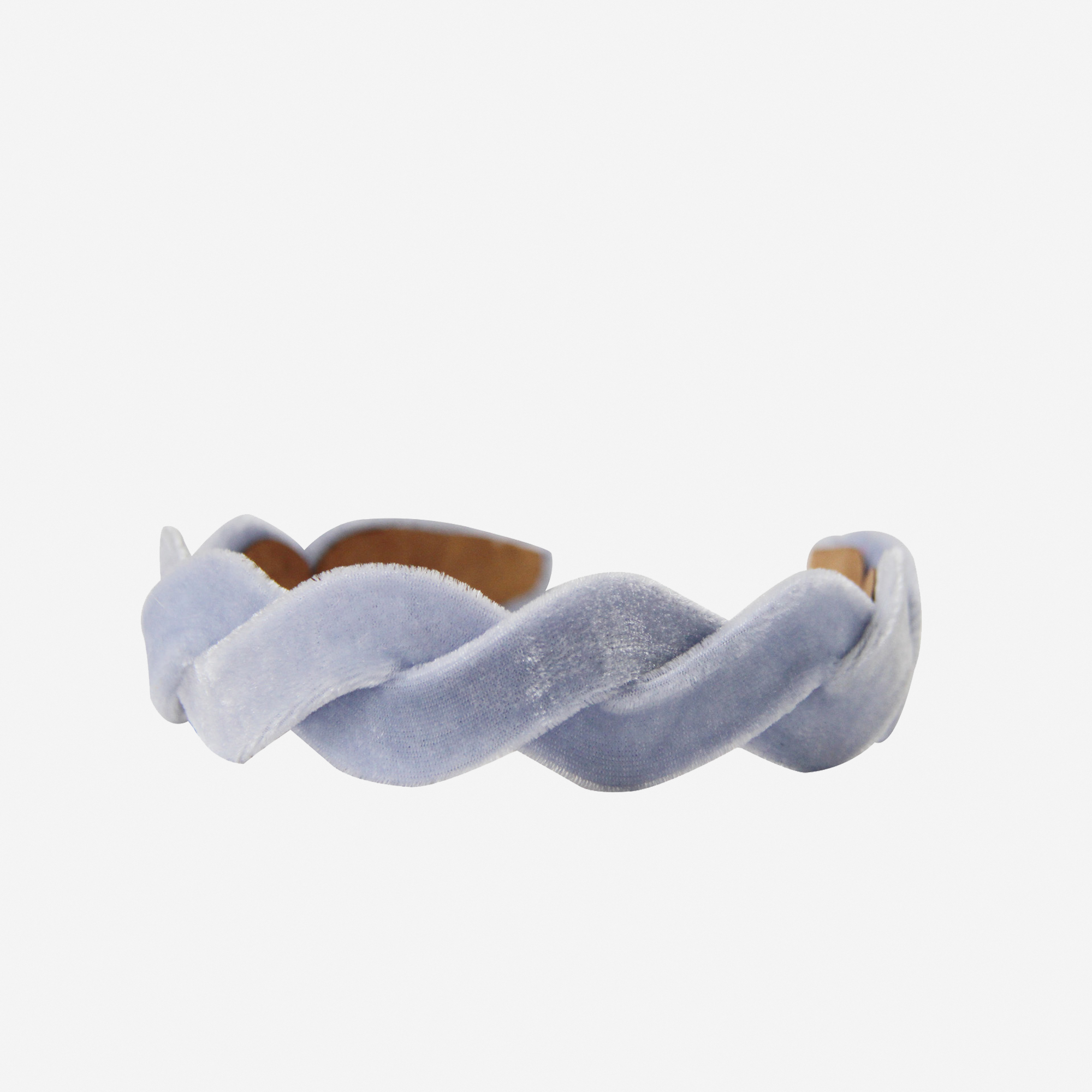 Light blue velvet wave headband on an off white background