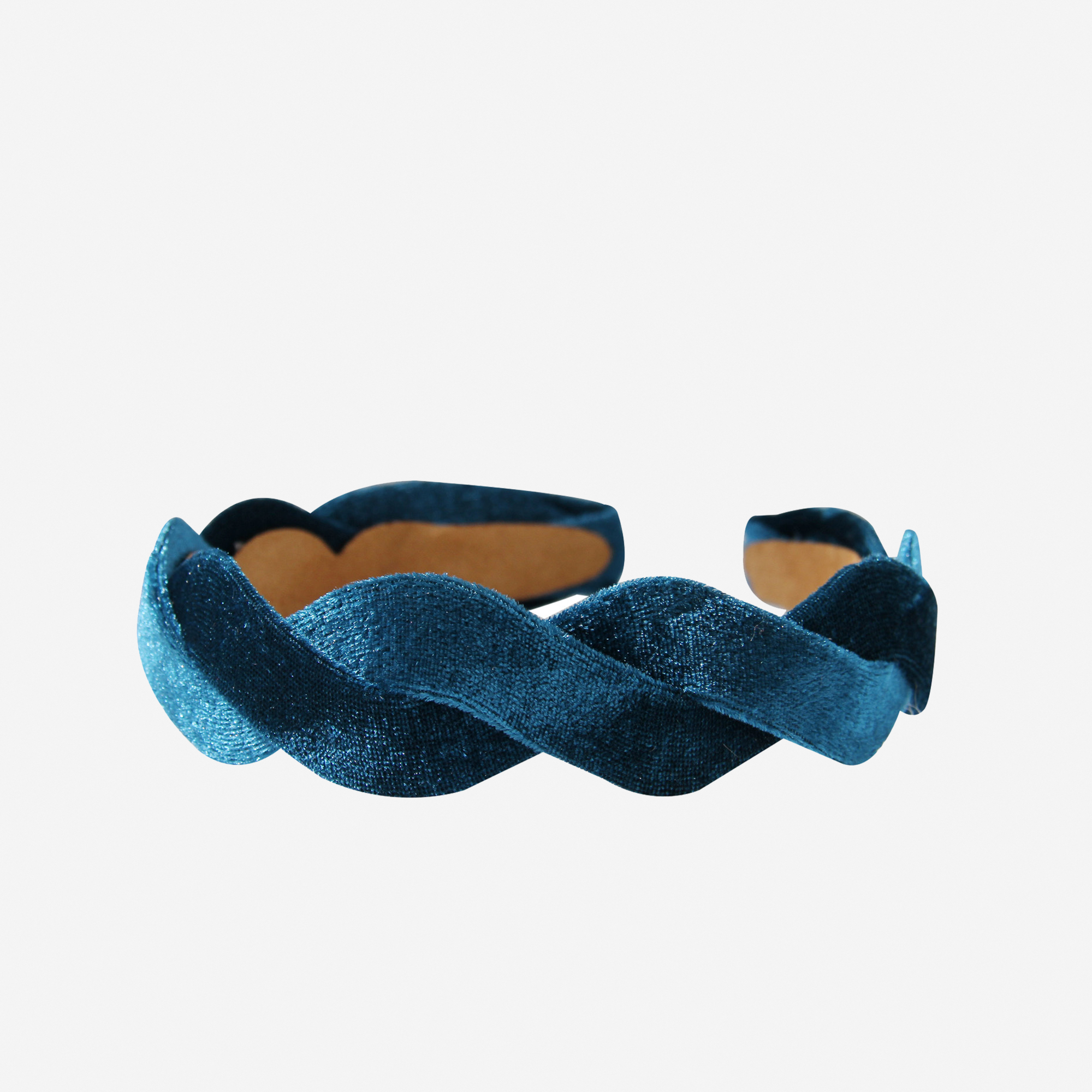 Teal velvet wave headband on an off white background
