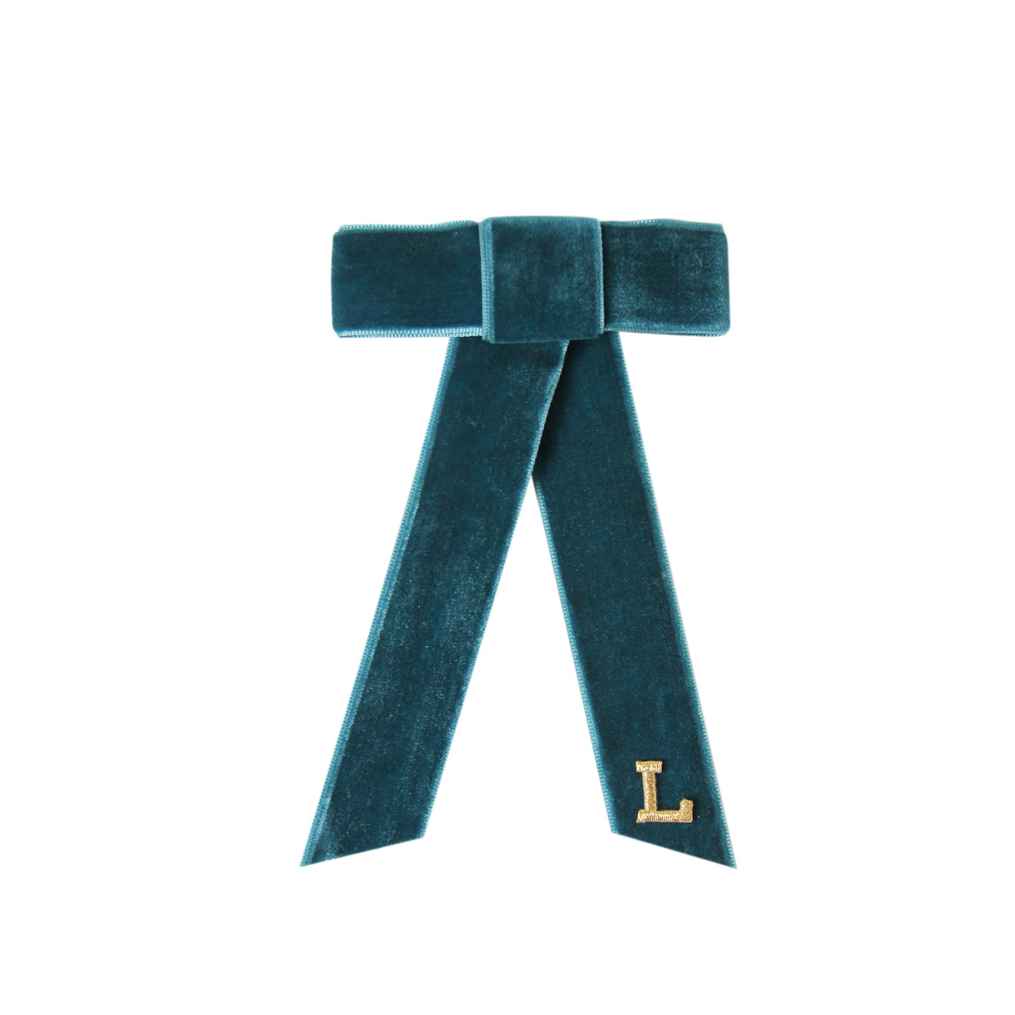 Monogrammed teal velvet hair bow with a gold letter 'L' on a white background